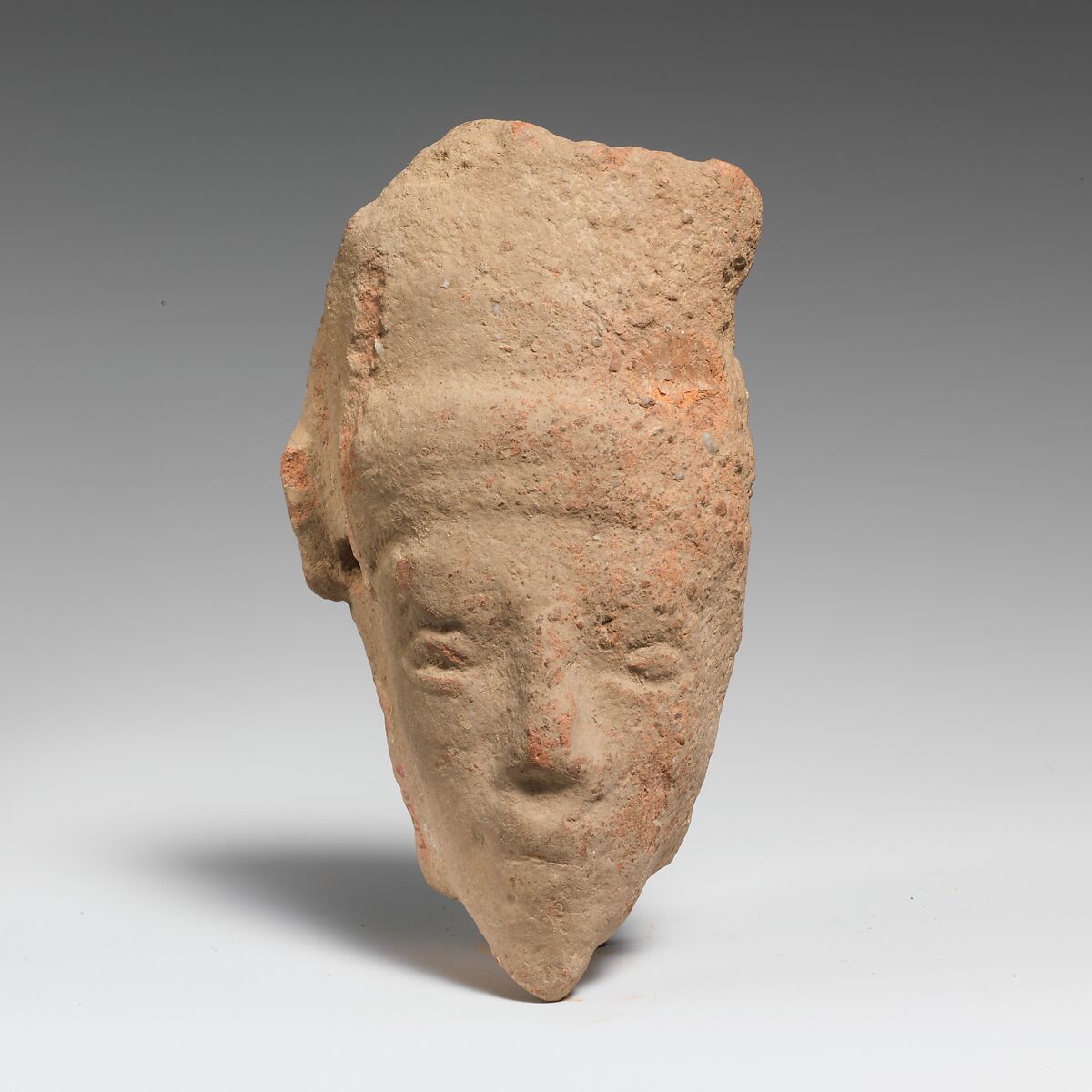 Fragment of a terracotta head, Terracotta, Greek, Cretan 