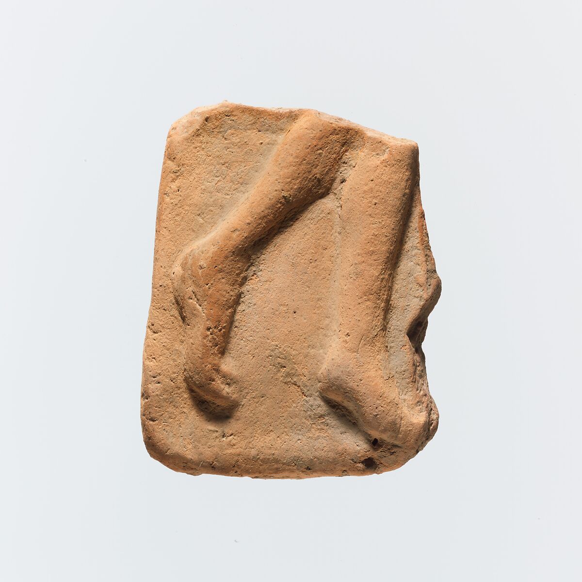 Fragment of a terracotta plaque, Terracotta, Greek 