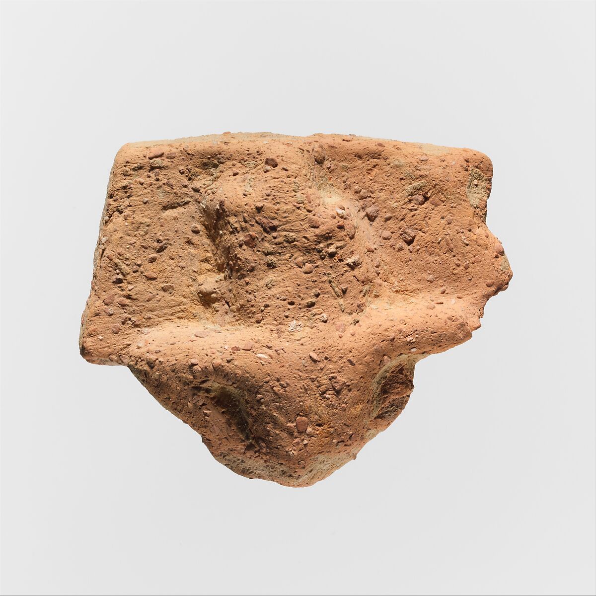 Fragment of a terracotta plaque, Terracotta, Greek, Cretan 