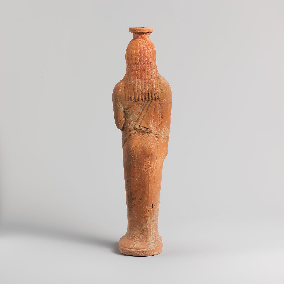 Terracotta vase in the form of a woman holding a bird, Terracotta, East Greek