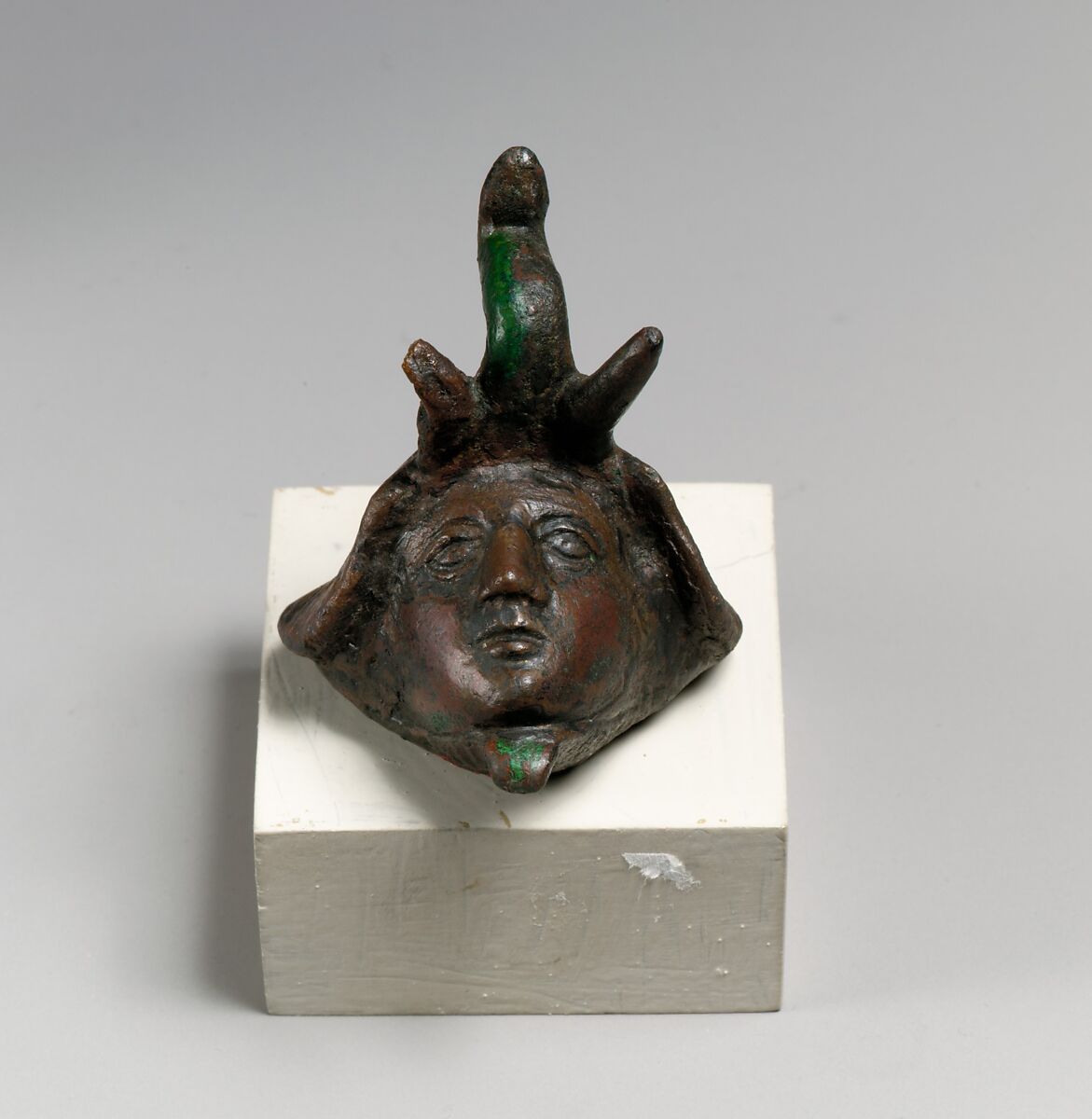 Head with elephant spoils, Bronze, Greek, Egypt 