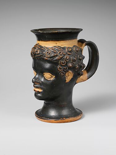 Terracotta mug in the form of a Black African youth's head