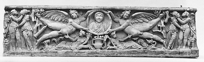 Marble sarcophagus with flying erotes holding a clipeus portrait, Marble, Proconnesian, Roman