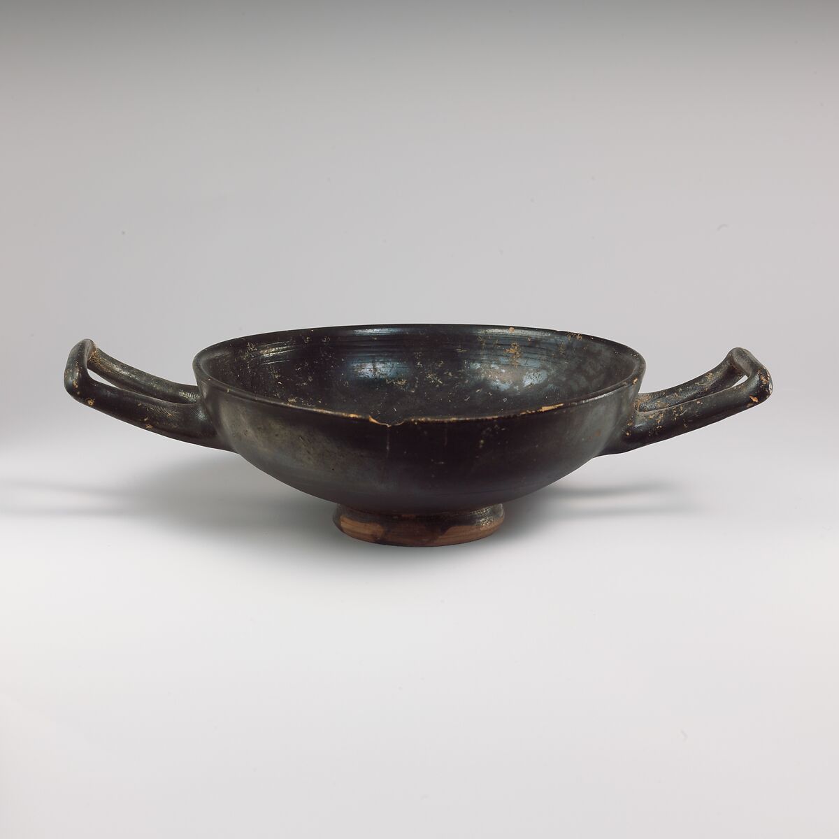 Terracotta stemless kylix (drinking cup), Terracotta, Greek, South Italian, Campanian 
