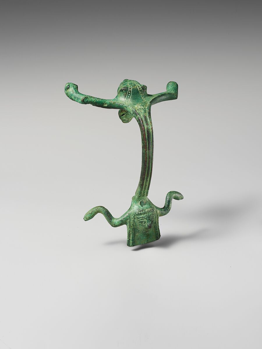 Bronze oinochoe (jug) handle with lion's head and female protome, Bronze, Etruscan 