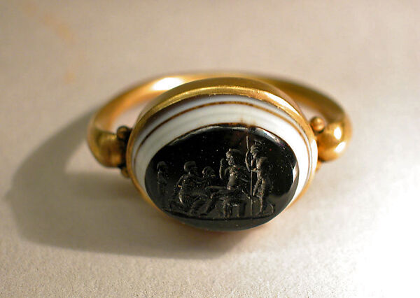 Gold ring with onyx intaglio