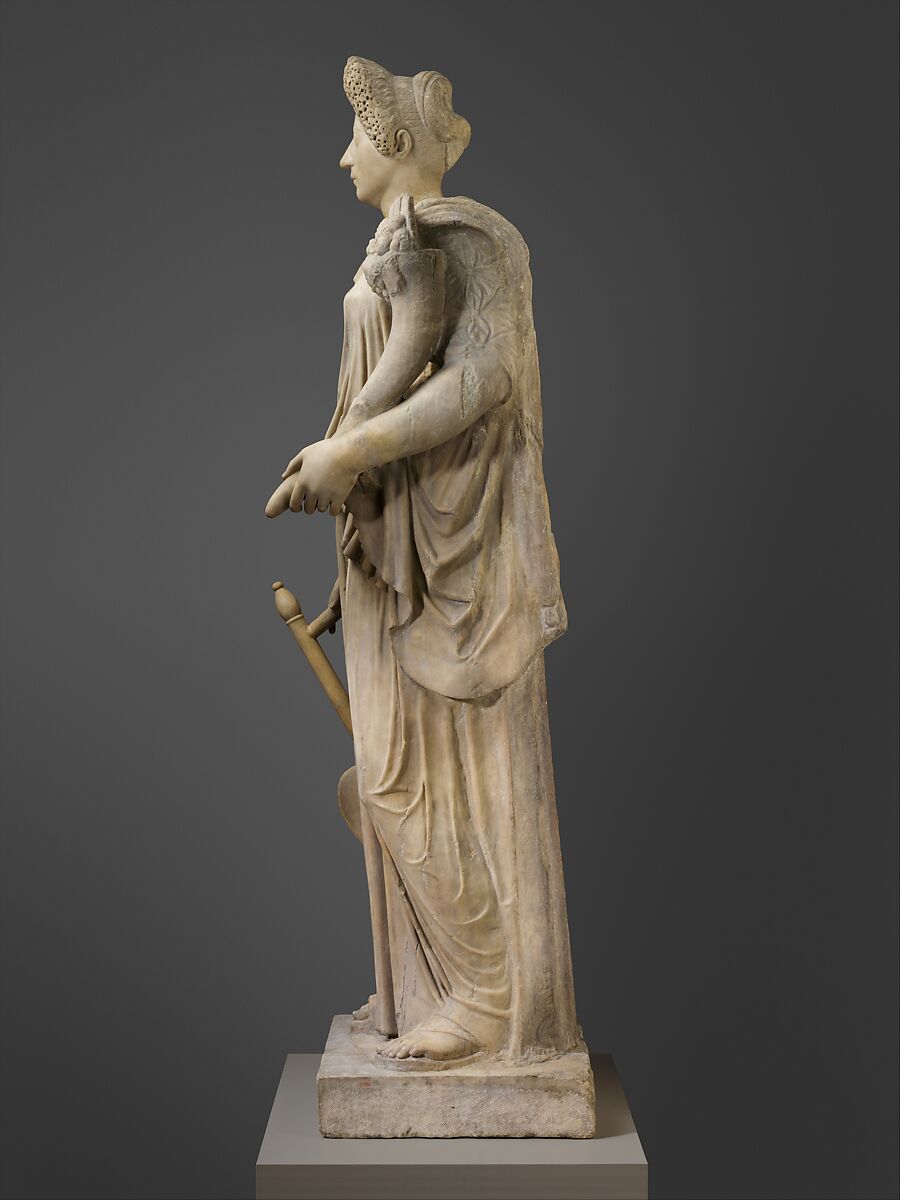 Marble statue of Tyche-Fortuna restored with the portrait head of a woman, Marble, Roman