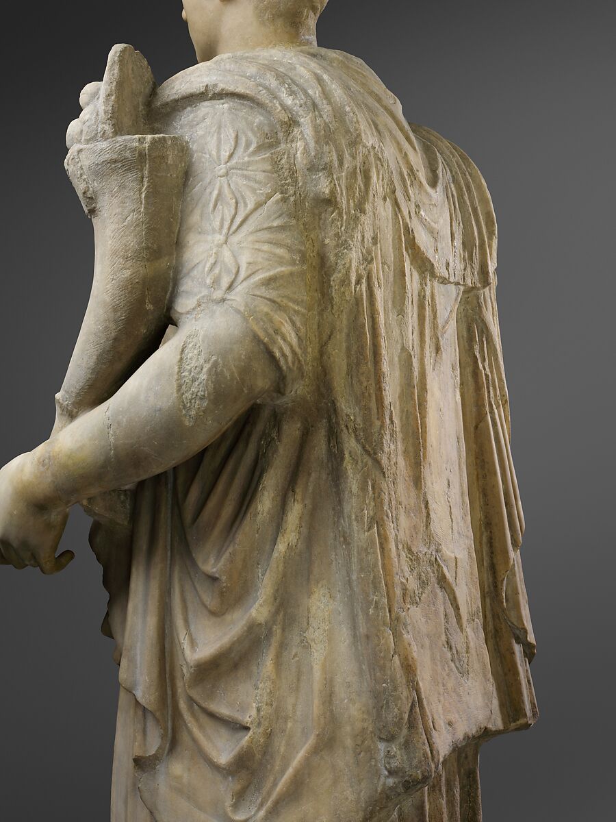 Marble statue of Tyche-Fortuna restored with the portrait head of a woman, Marble, Roman