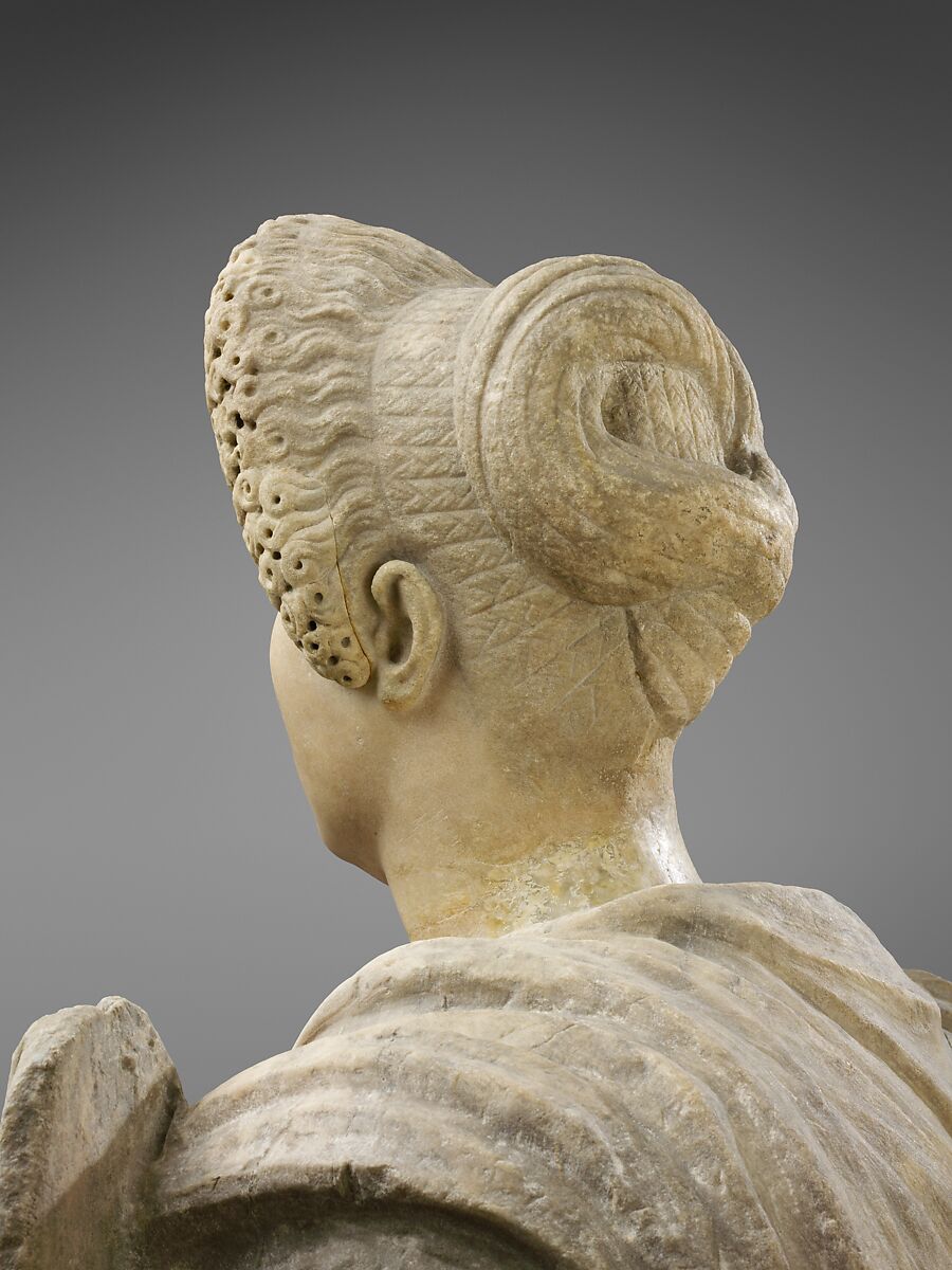 Marble statue of Tyche-Fortuna restored with the portrait head of a woman, Marble, Roman