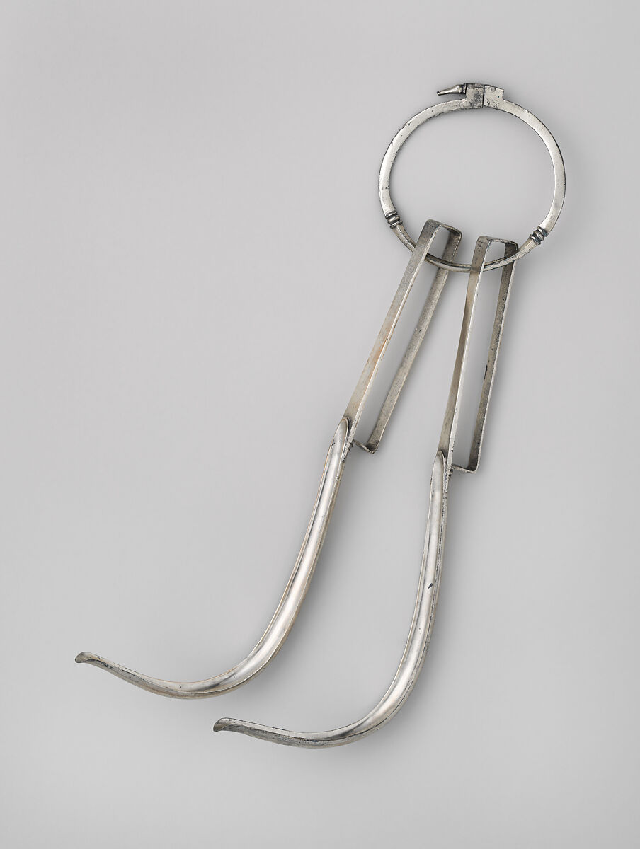 Pair of silver strigils (scrapers) on a carrying ring, Silver, Roman 