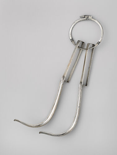 Pair of silver strigils (scrapers) on a carrying ring