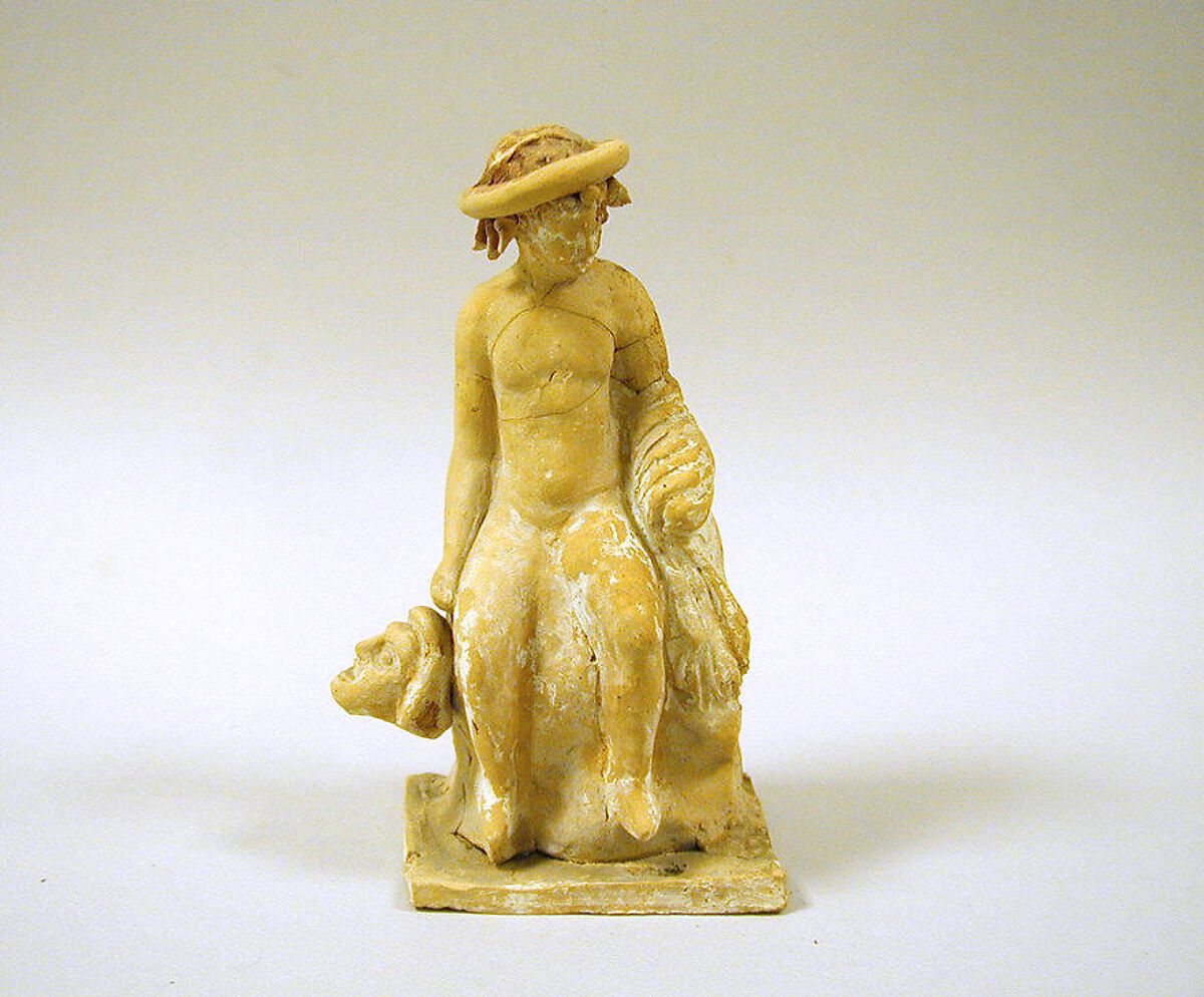 Terracotta statuette of a seated youth, Terracotta, Greek, Boeotian 