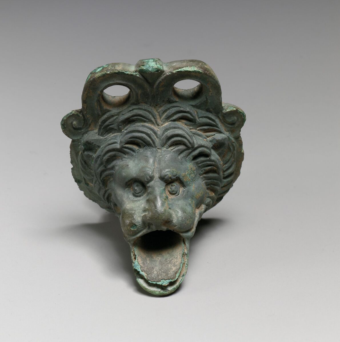 Bronze spout in the form of a lion's head, Bronze, Greek 
