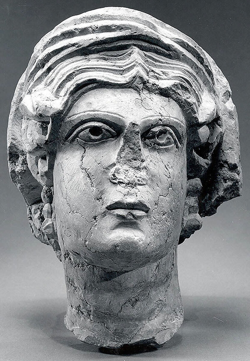 Marble female head from a relief, Limestone 