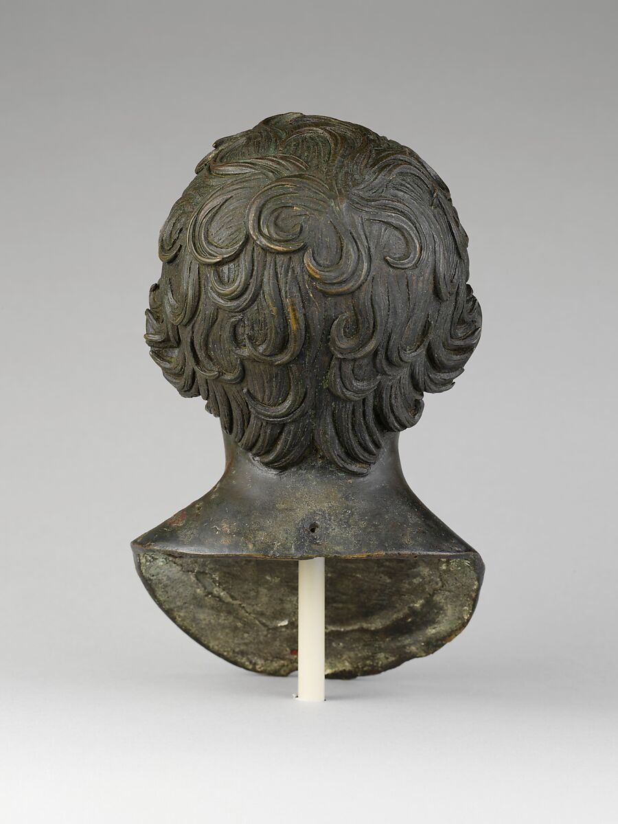 Bronze portrait bust of a young boy, Bronze, silver, Roman