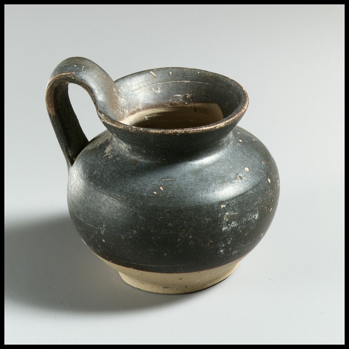 Jug, miniature, Terracotta, Italic-Native, South Italian (Tarentine) 