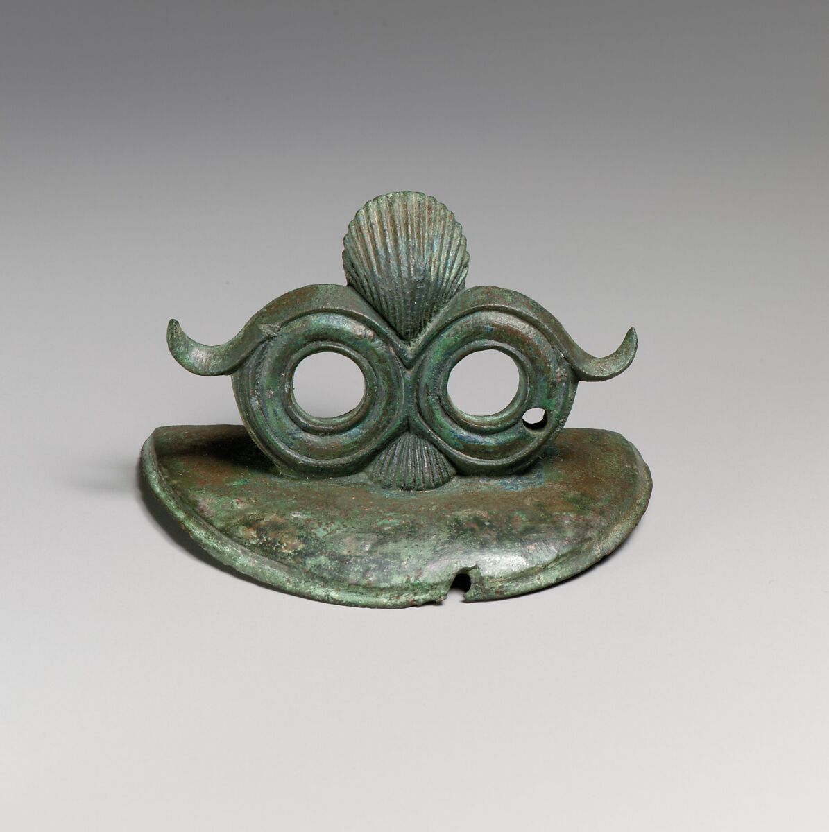 Pair of bronze handle attachments from a situla (bucket), Bronze, Etruscan