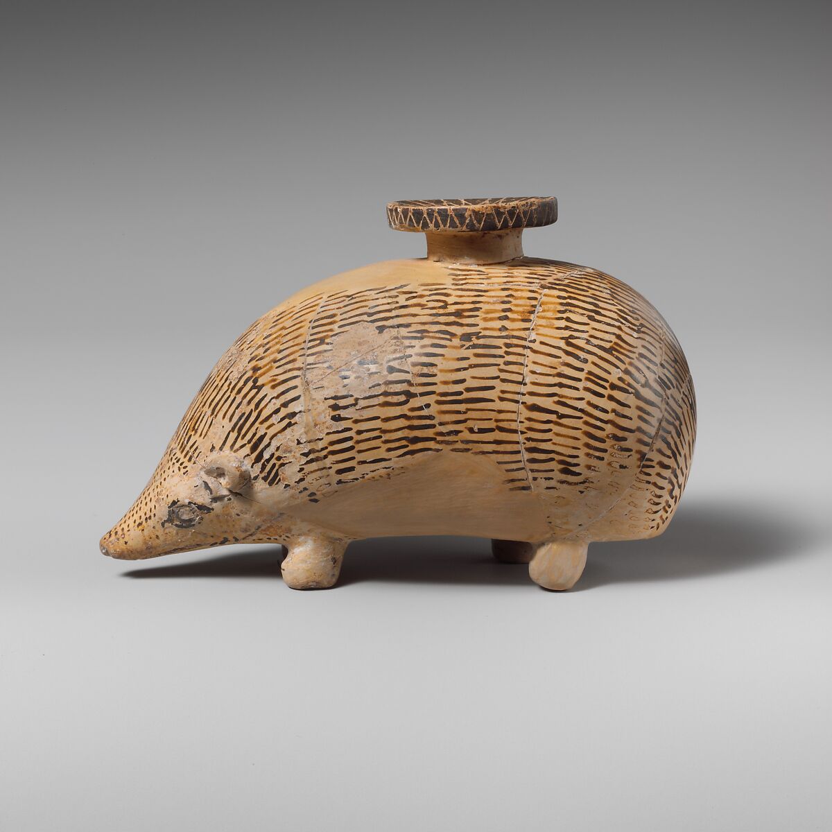 Terracotta aryballos (perfume vase) in the form of a hedgehog, Terracotta, Rhodian 