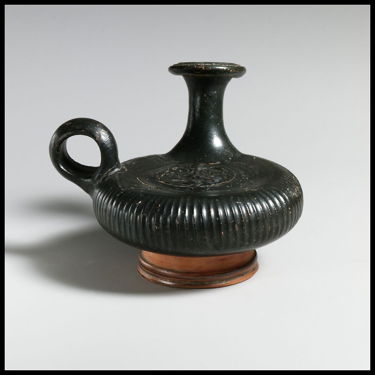 Terracotta guttus (flask with handle and vertical spout), Terracotta, Greek, South Italian, Apulian 
