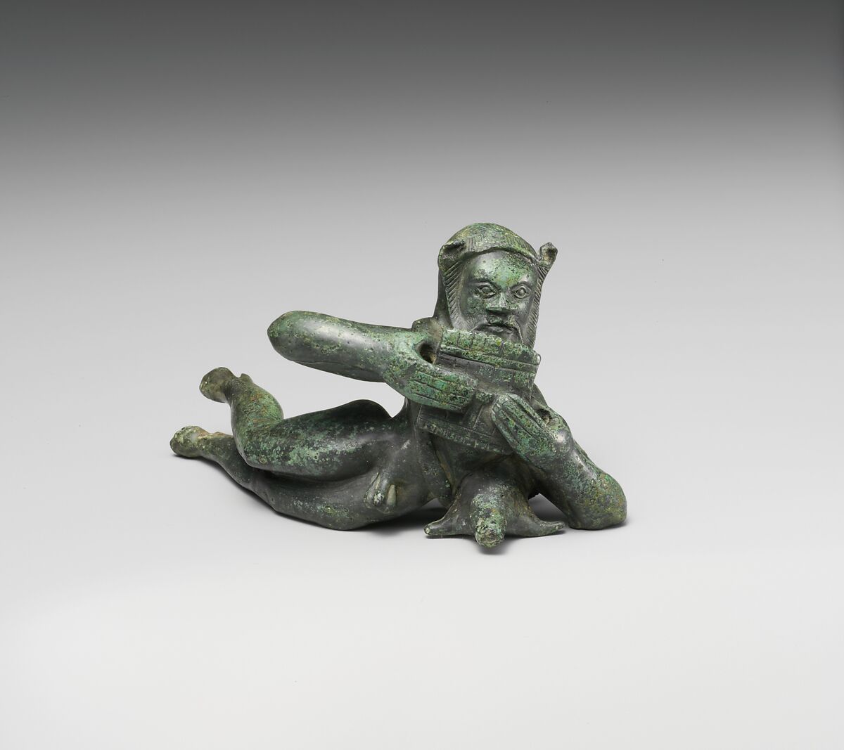 Bronze statuette of a reclining satyr, Bronze, Etruscan 