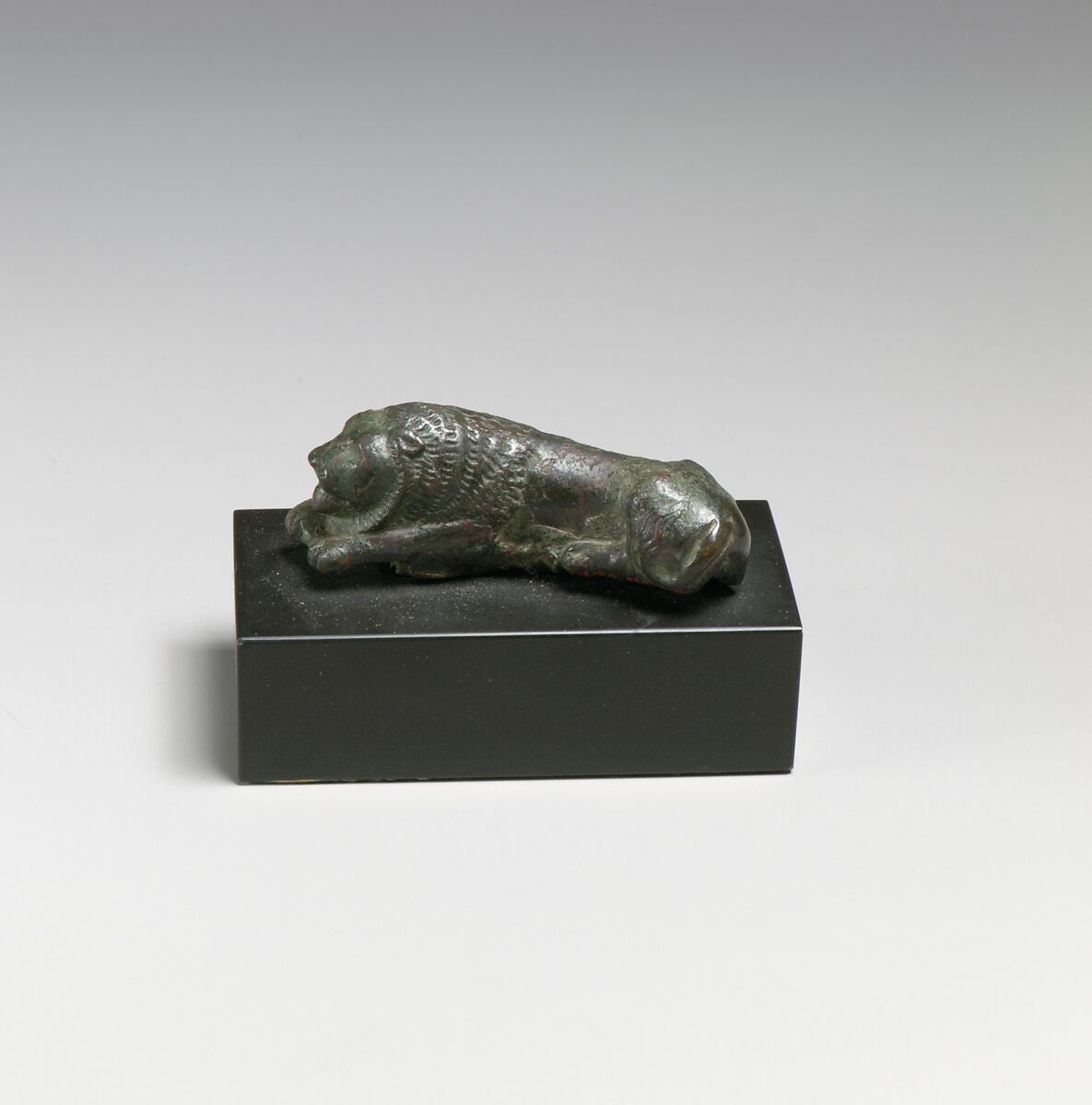 Bronze statuette of a recumbent lion, Bronze, Greek 