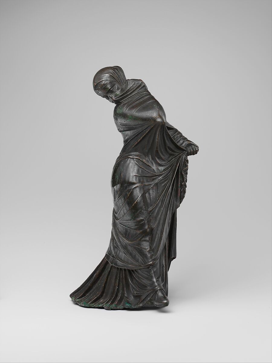 Bronze statuette of a veiled and masked dancer, Bronze, Greek 