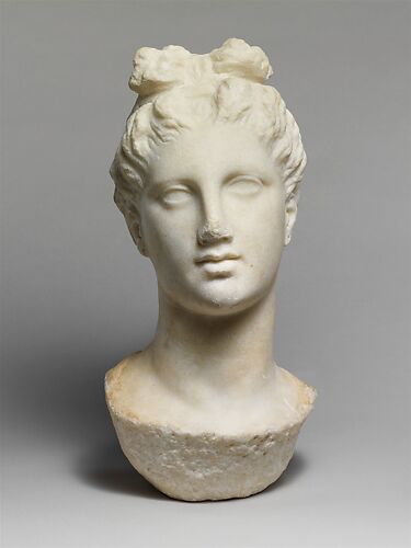 Marble head of a young woman from a funerary statue