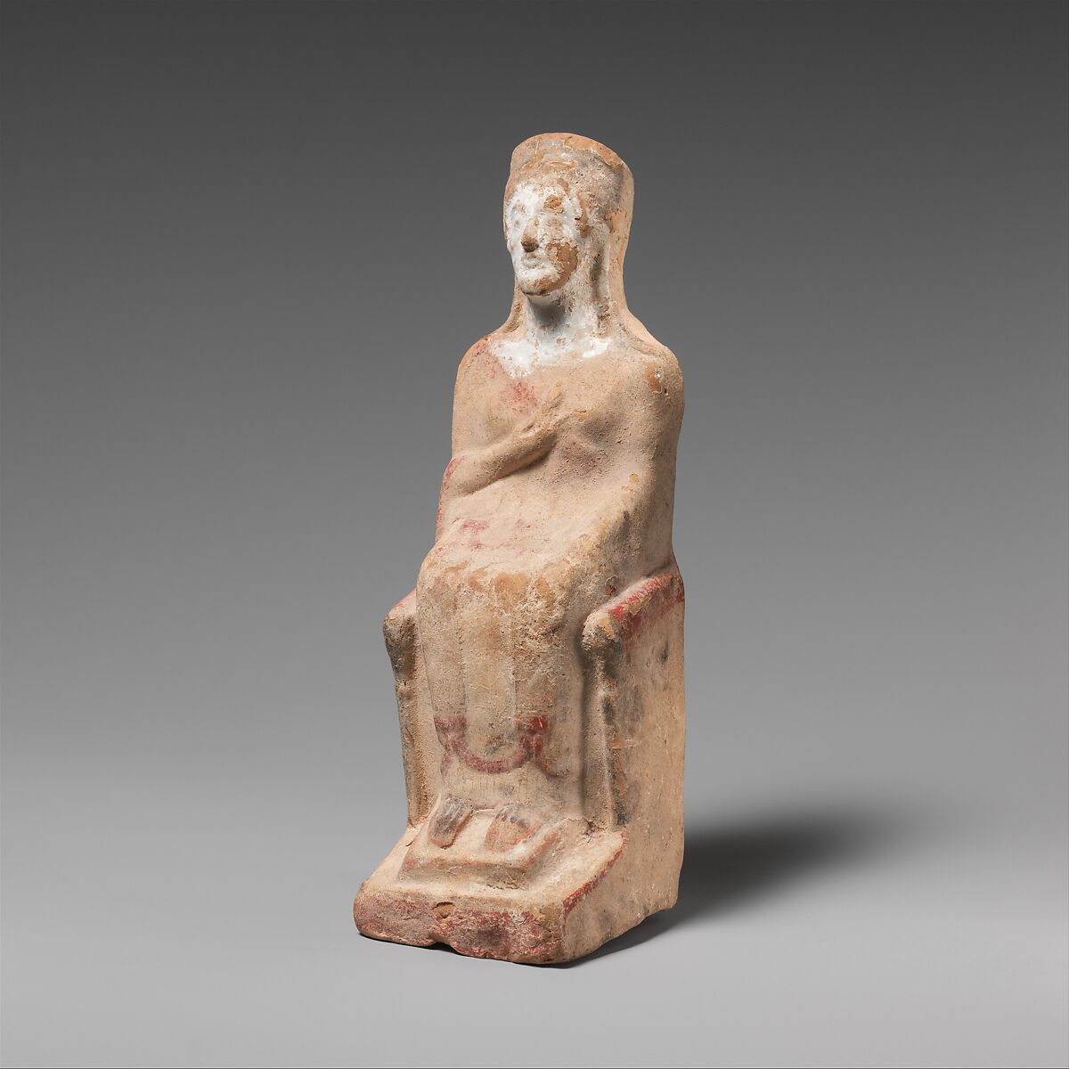 Terracotta statuette of a seated woman, Terracotta, Greek, Attic 