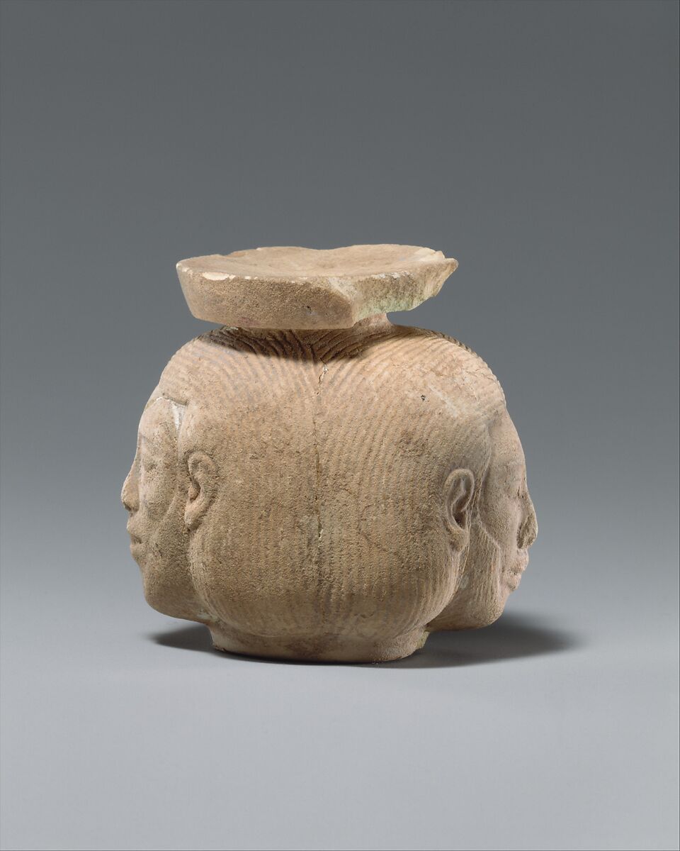 Faience aryballos (perfume vase) in the form of two heads, Faience, East Greek 