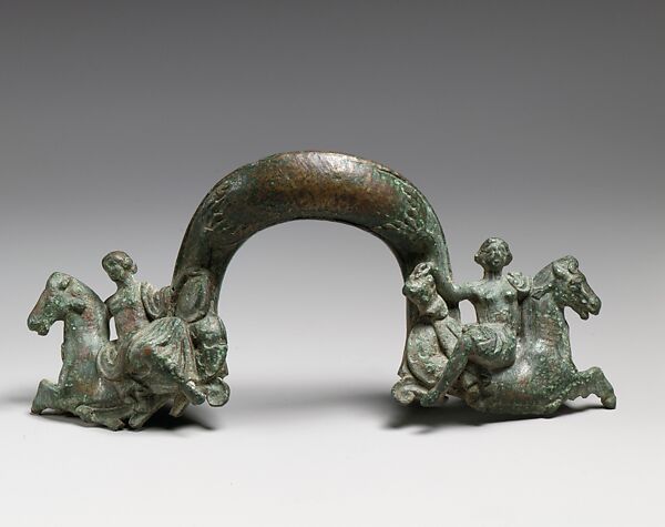 Bronze handle of a shallow basin