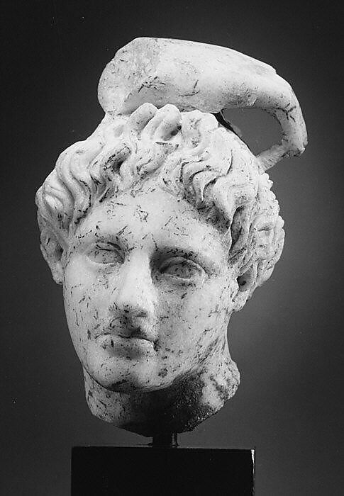 Marble head of Apollo with fragment of his hand, Marble, Roman
