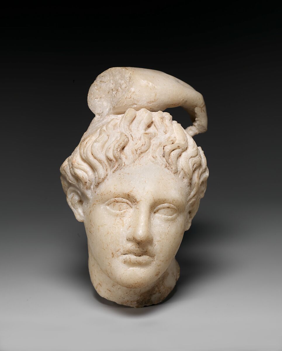 Marble head of Apollo with fragment of his hand, Marble, Roman 