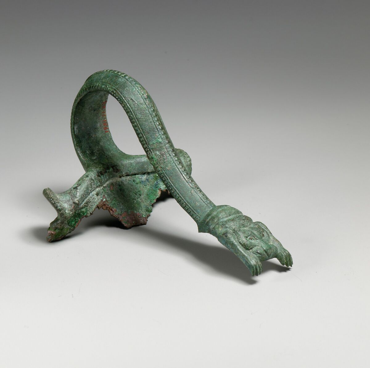 Bronze handle of an oinochoe (jug), Bronze, Greek 