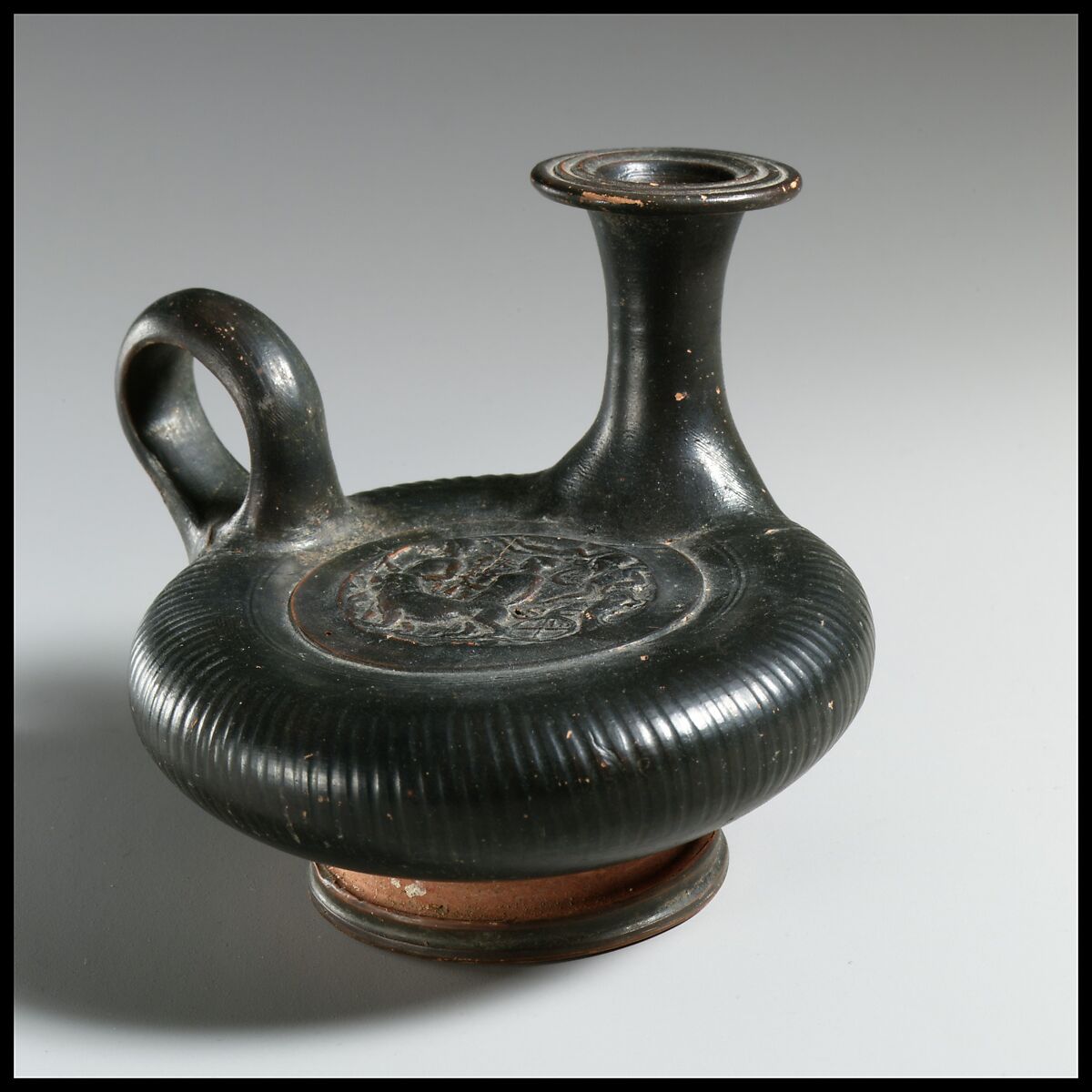 Terracotta guttus (flask with handle and vertical spout), Terracotta, Greek, South Italian, Campanian 
