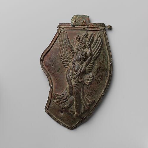 Bronze cheek piece of a helmet