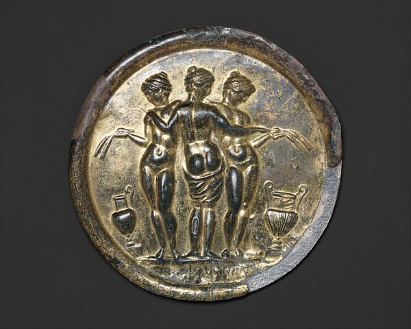 Gilded bronze mirror with the Three Graces