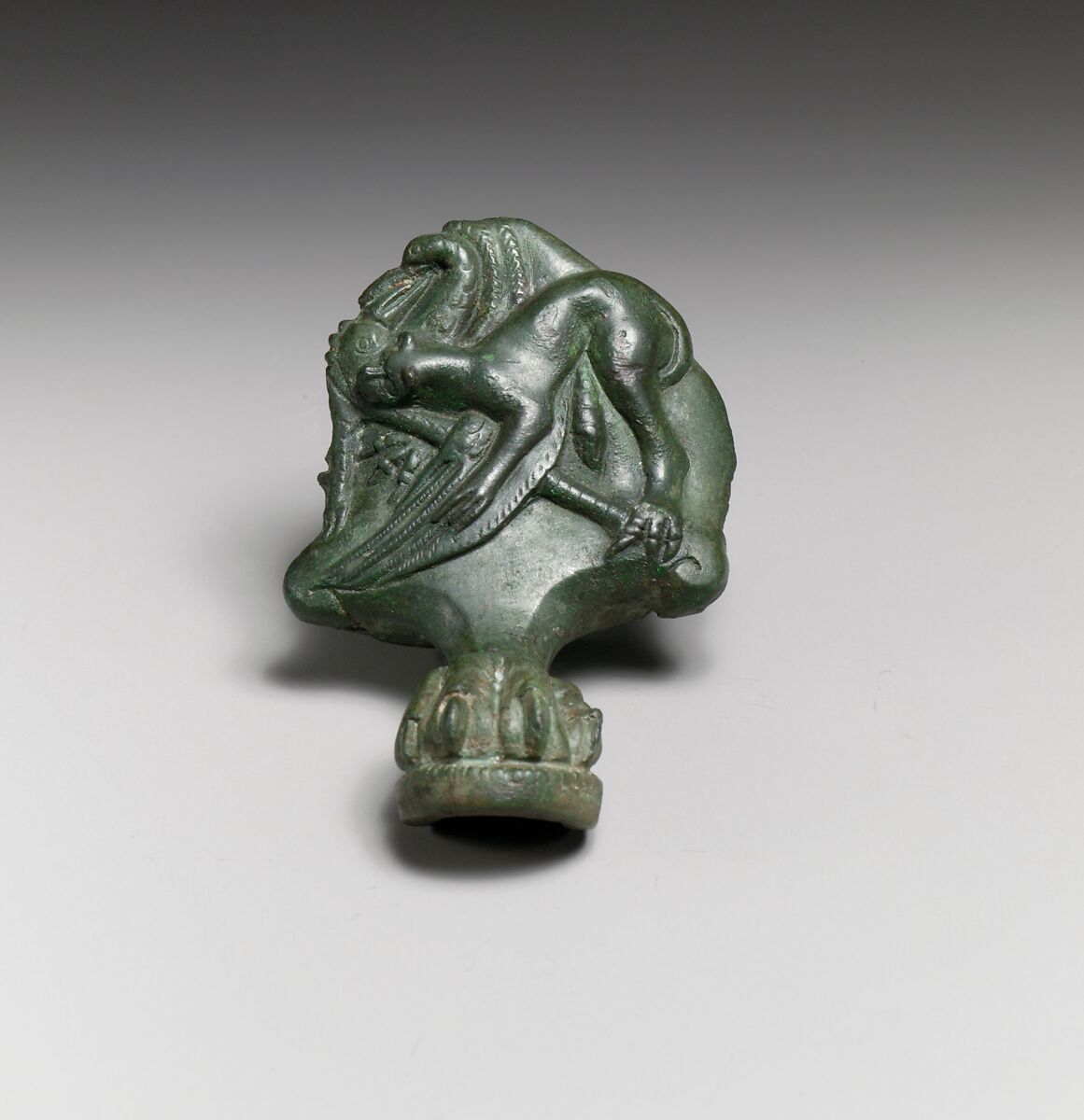 Pair of bronze cista (toiletries box) feet with panthers attacking cranes, Bronze, Praenestine