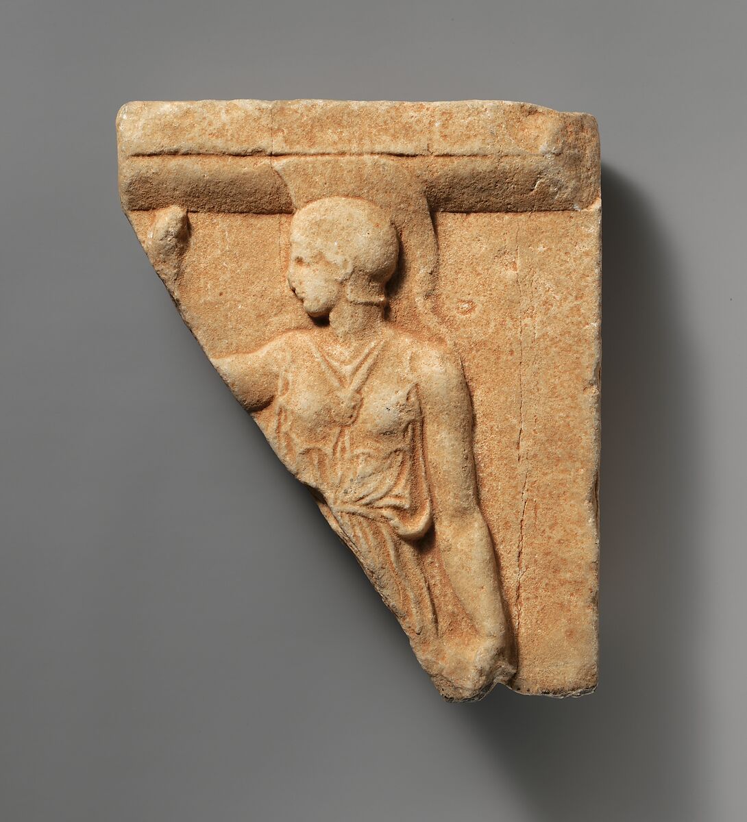 Marble fragment of a votive relief with Athena, Marble, Greek, Attic 