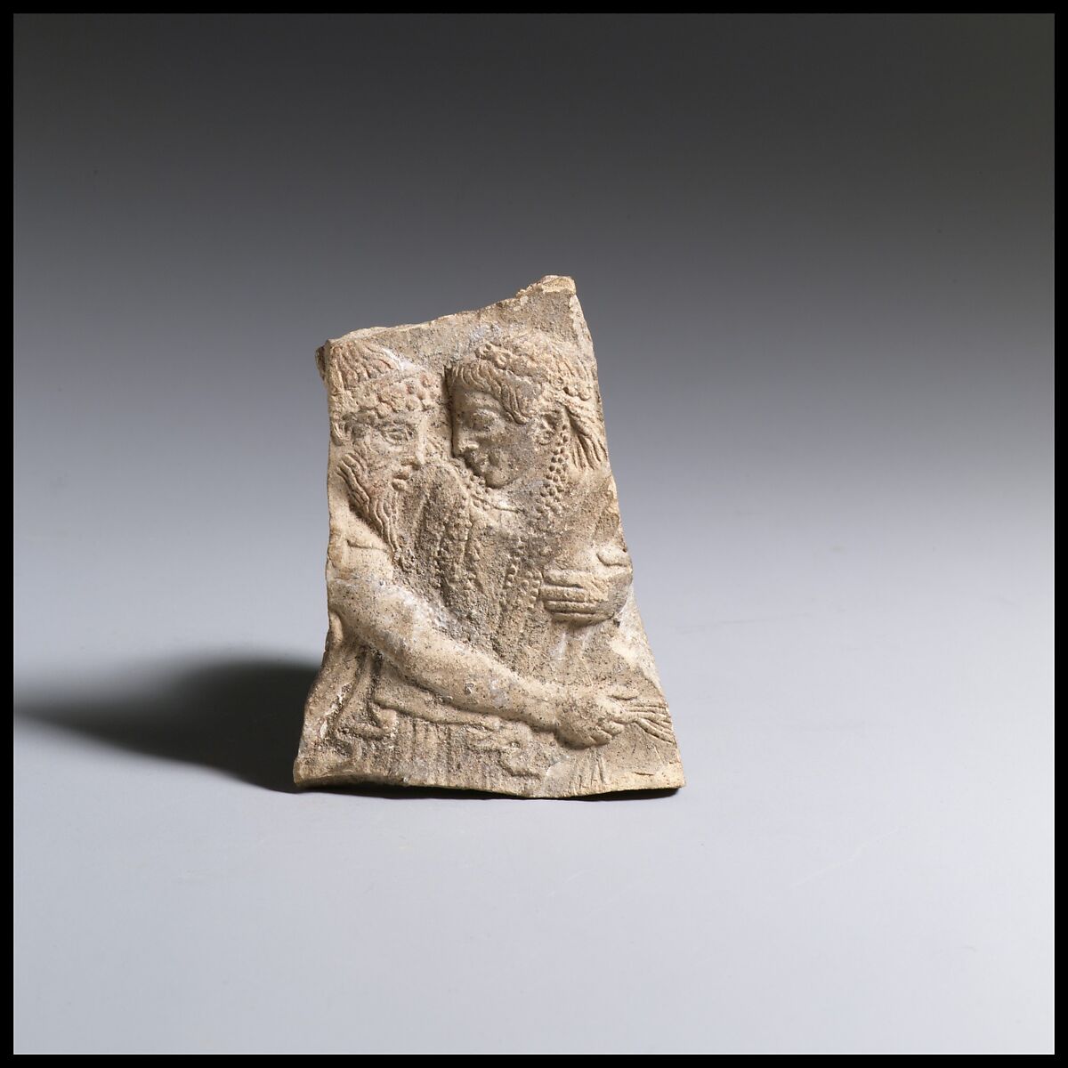 Terracotta fragment of a votive relief, Terracotta, Greek, South Italian, Locrian 