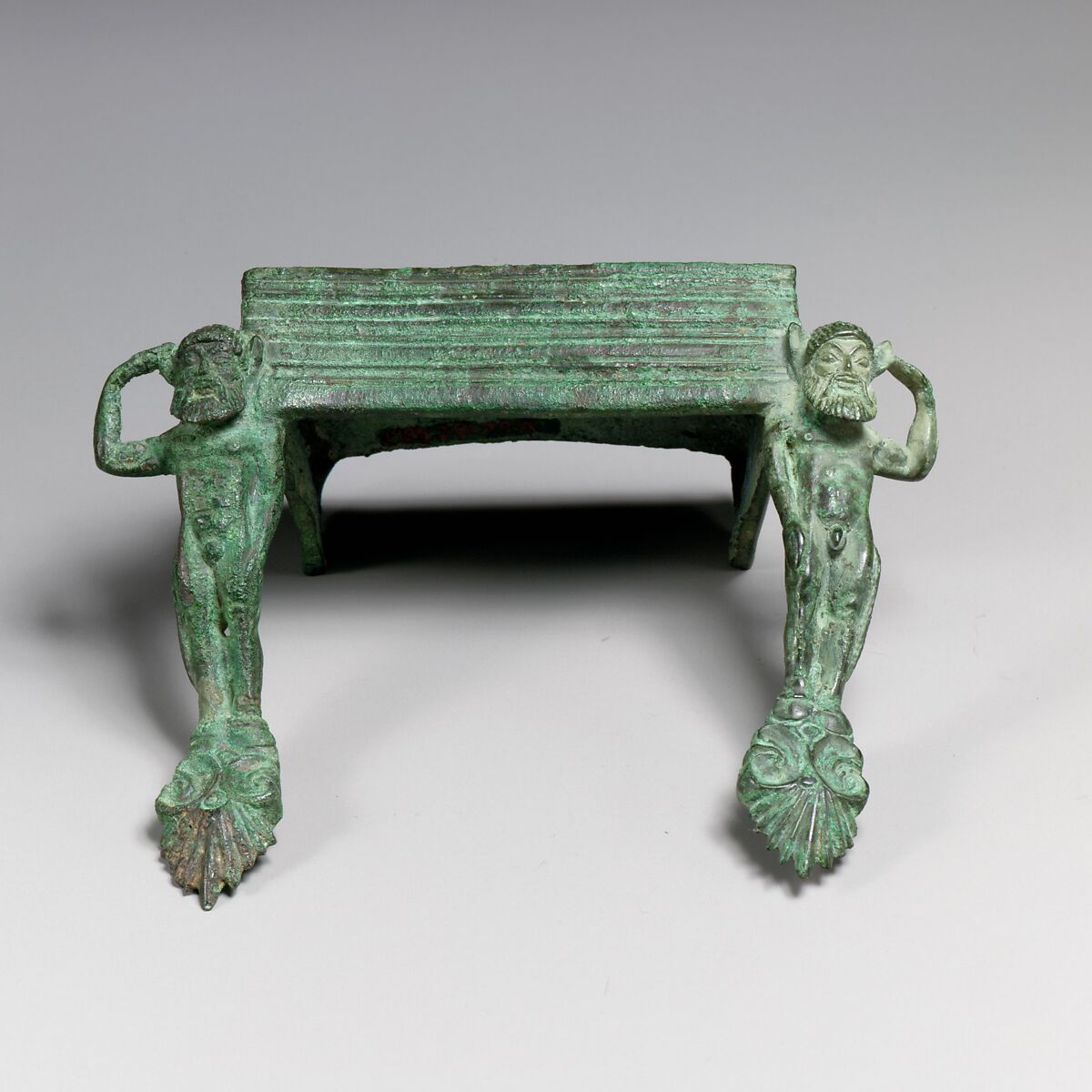 Pair of bronze handles with satyrs, Bronze, Etruscan 