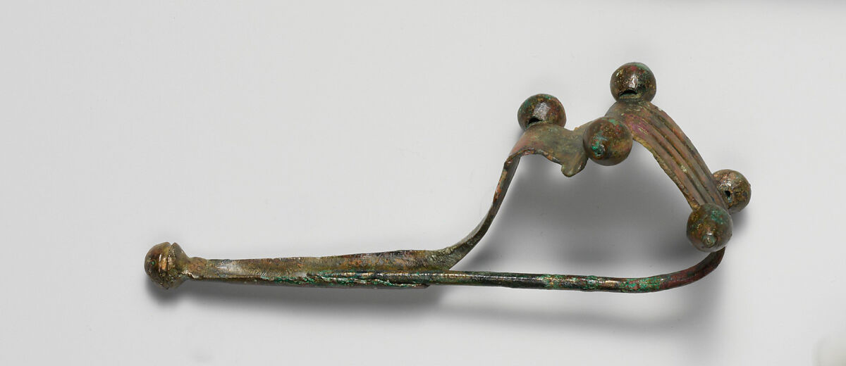 Bronze dragon-type fibula (safety pin), Bronze, Italic