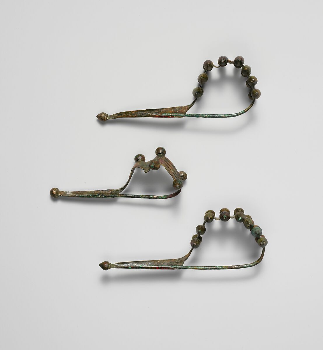 Bronze dragon-type fibula (safety pin), Bronze, Italic
