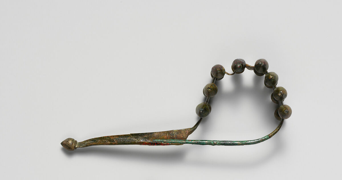 Bronze dragon-type fibula (safety pin), Bronze, Italic