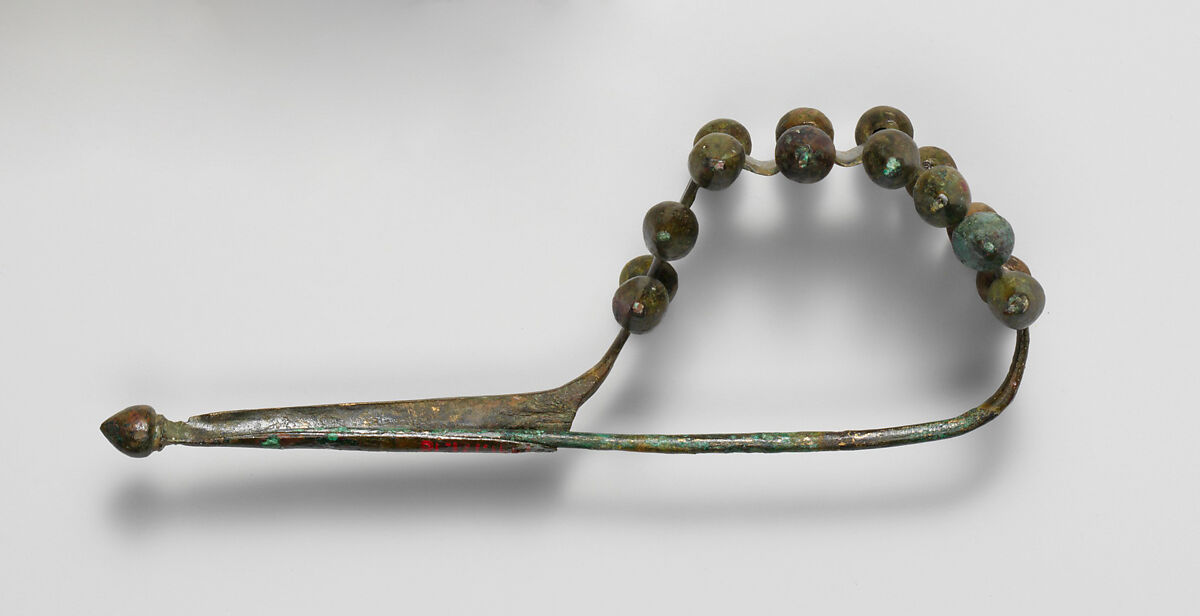 Bronze dragon-type fibula (safety pin), Bronze, Italic