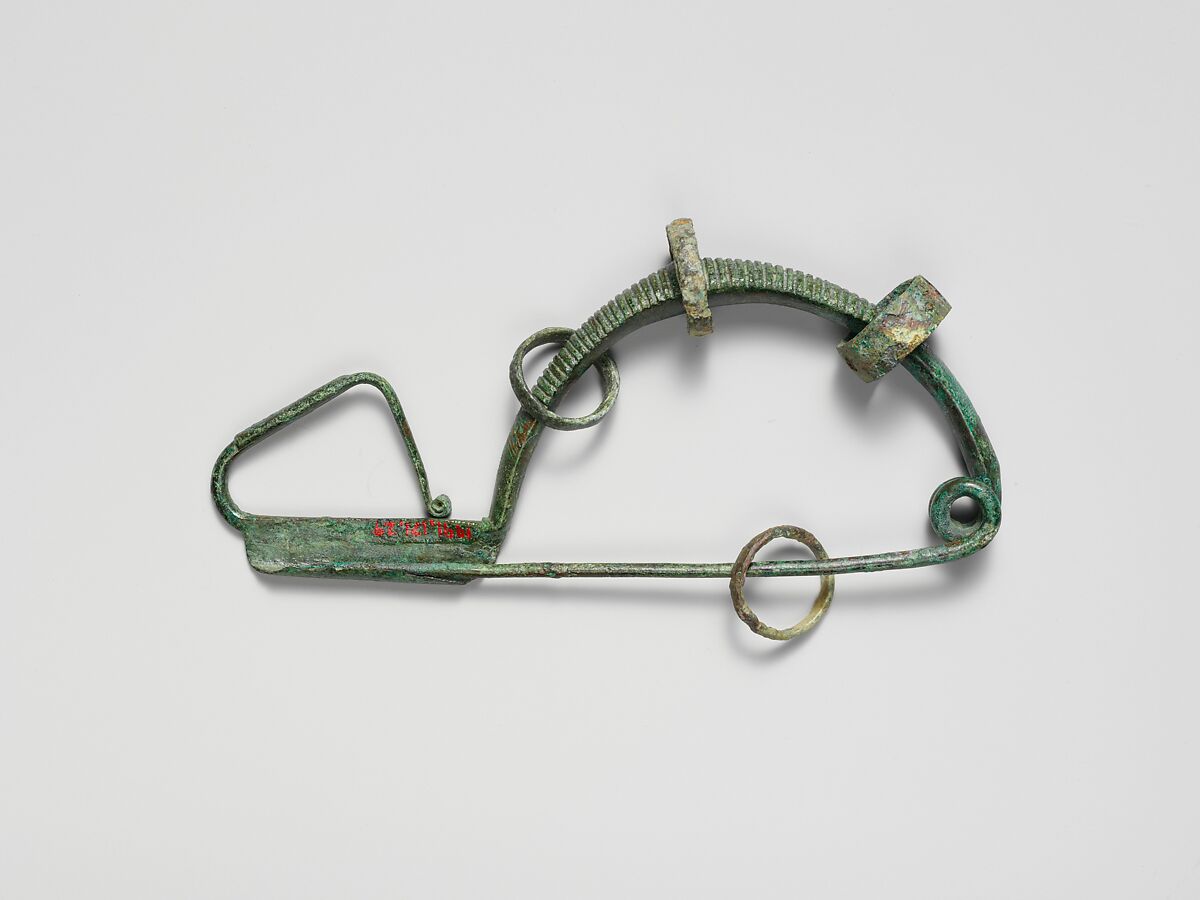 Bronze fibula (safety pin) with four rings, Bronze, Italic 