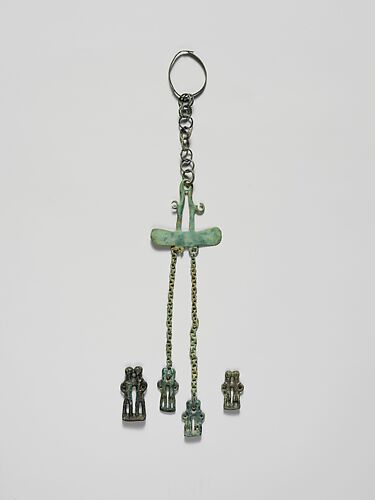 Bronze pendant in the form of a paired couple