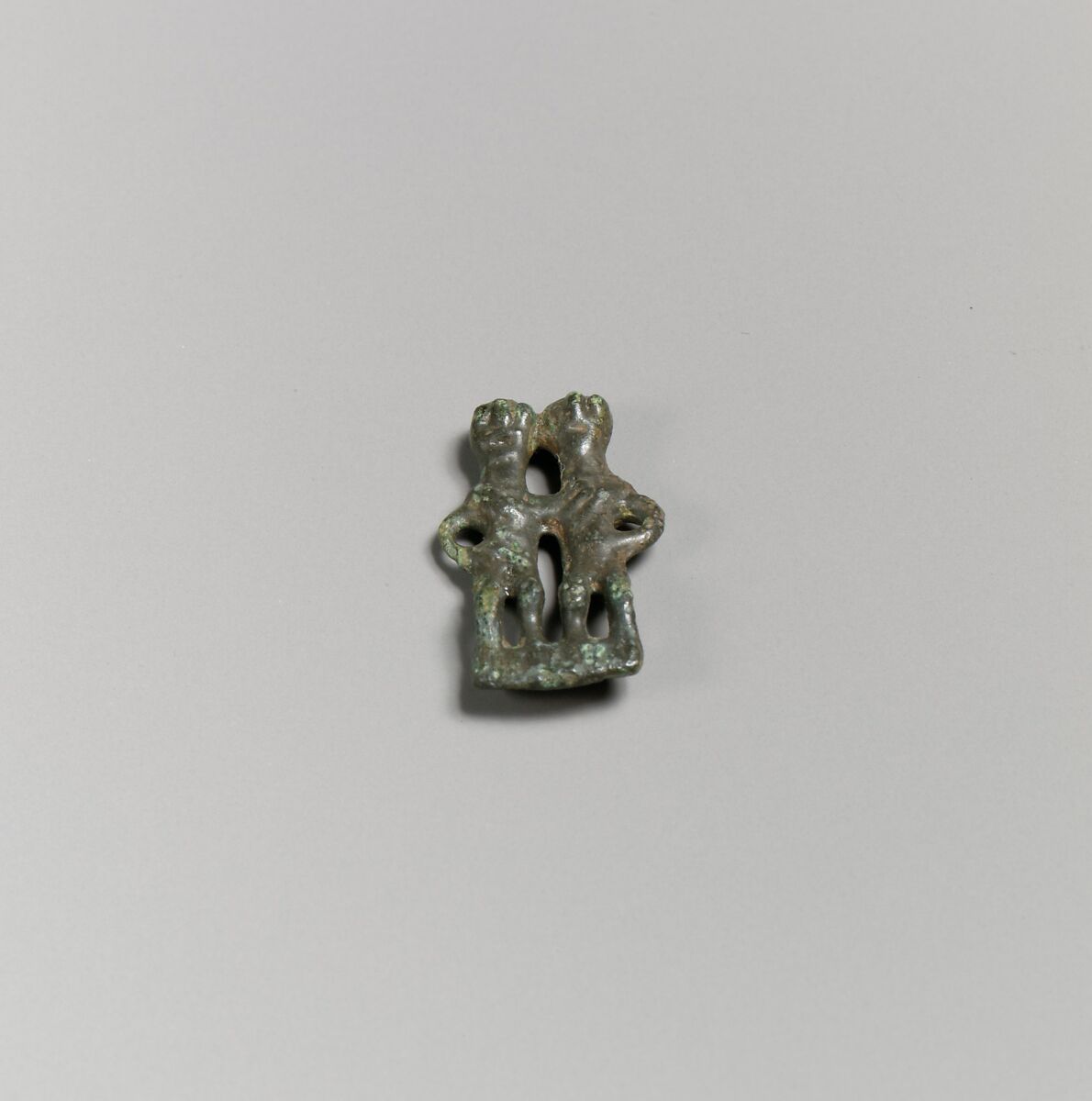 Bronze pendant in the form of a paired couple, Bronze, Villanovan 