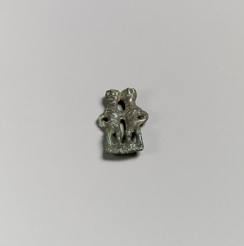 Bronze pendant in the form of a paired couple