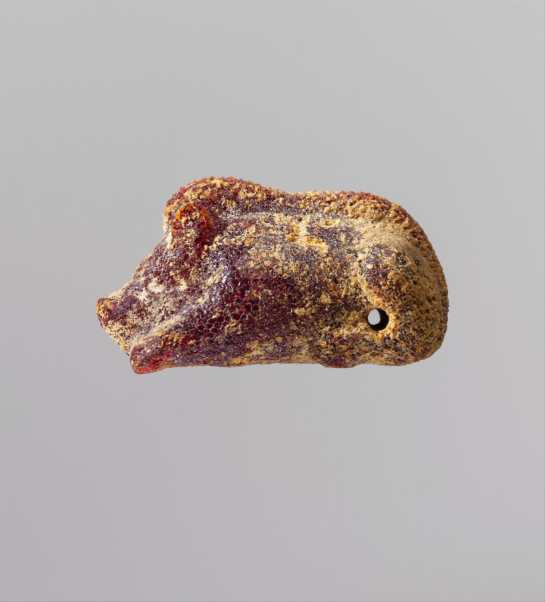 Pendant: recumbent boar, Amber, Etruscan or Italic 