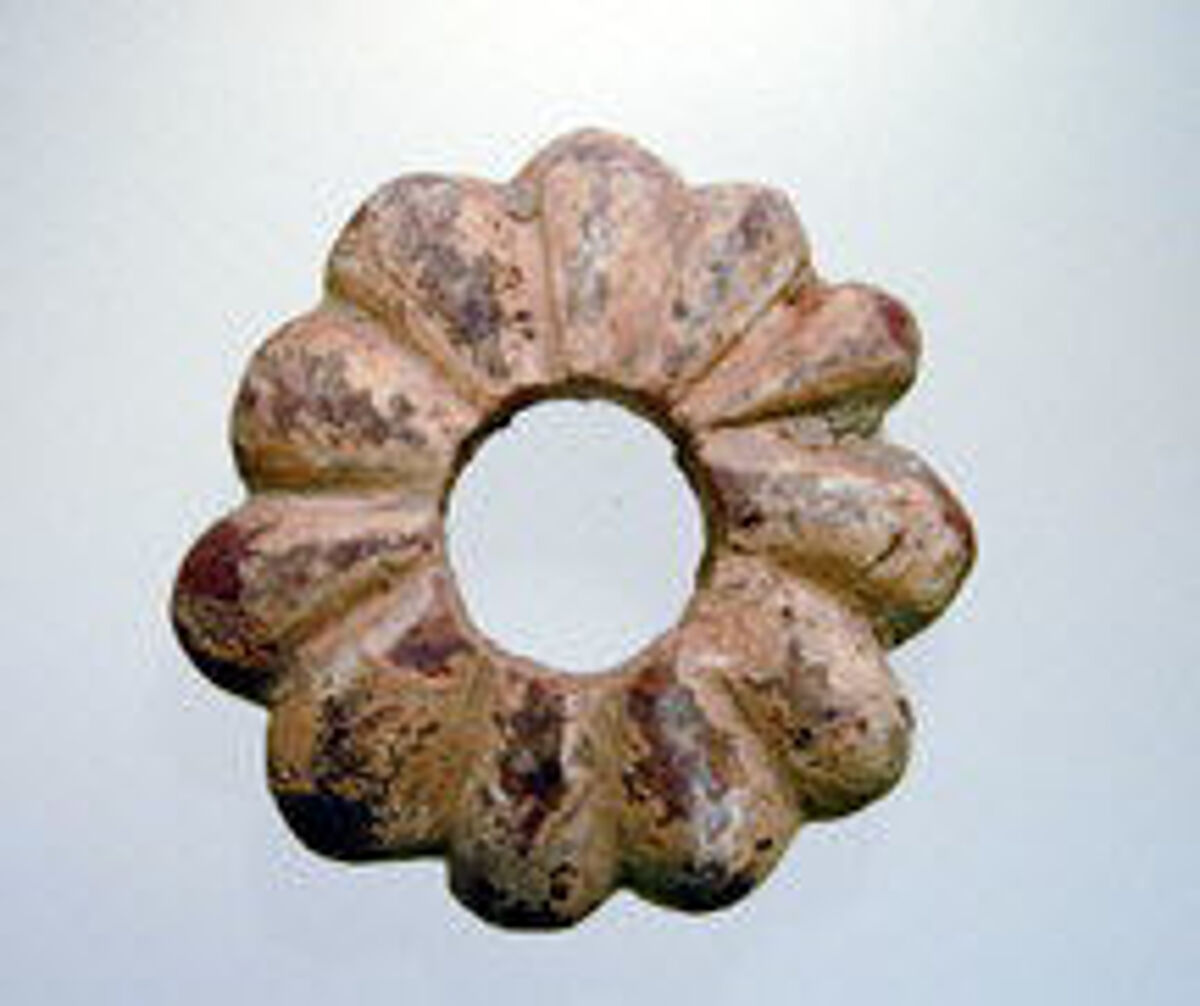 Flower-shaped bead, Amber, Italic 